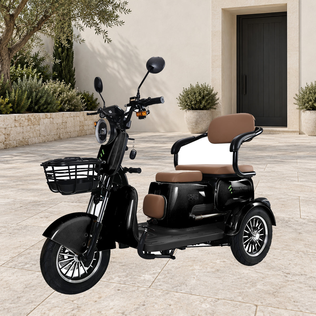Black Freejoyer FV6 in a quiet stone forecourt